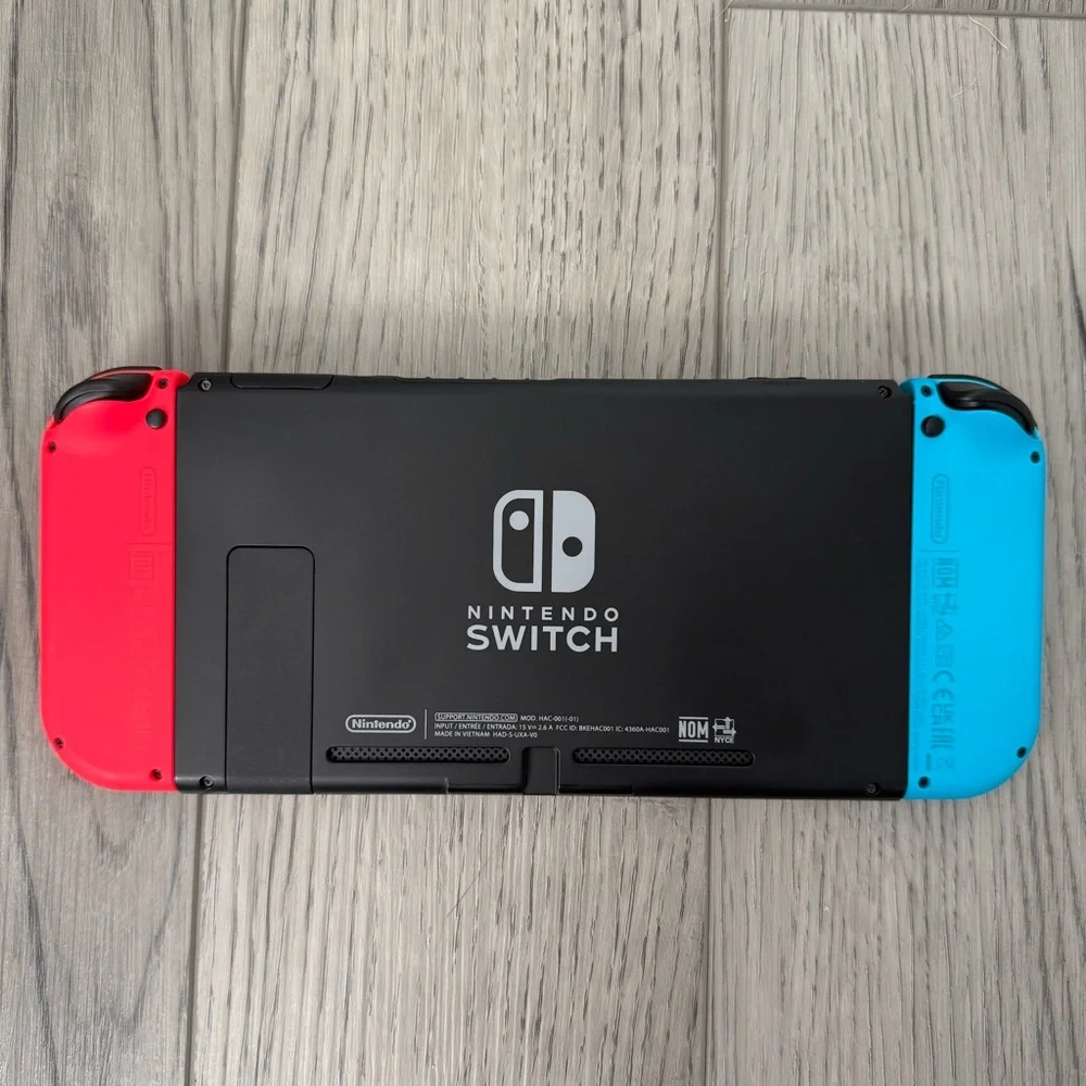 Nintendo Switch with Neon Blue and Neon Red Joy-Con